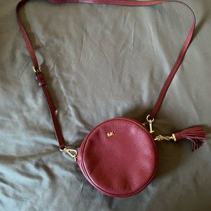 Red leather Michael Kors cross body bag.
